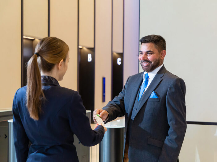Front of house professional, part of our london security business unit, engaging with customer