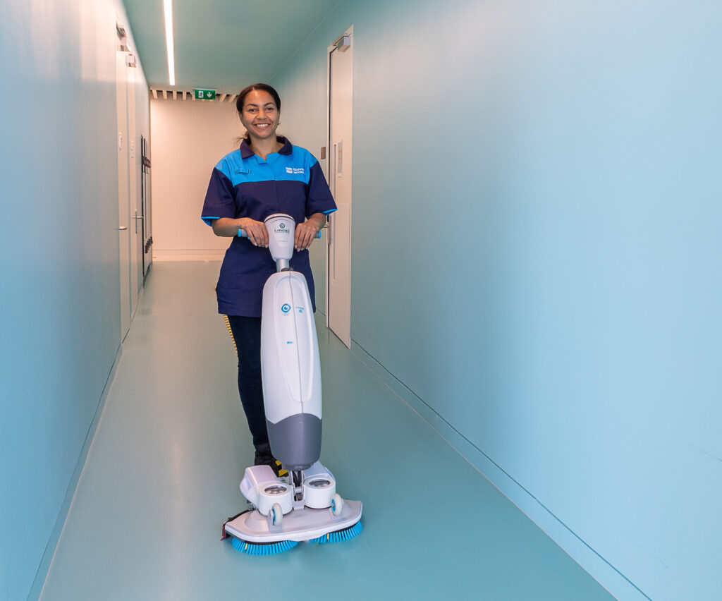 Bidvest Noonan cleaning operative using an i-Mop used for cleaning services